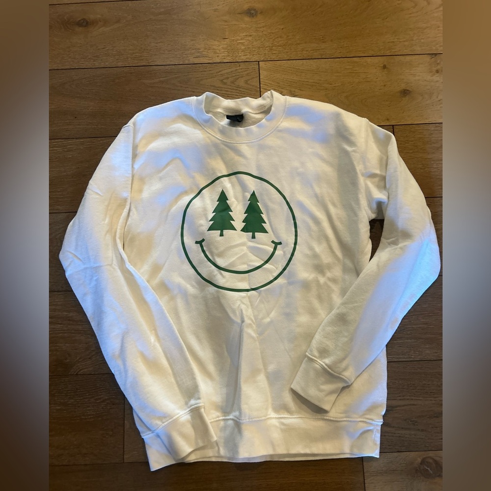 Christmas White Crewneck Sweatshirt with Green Smiley Tree Graphic